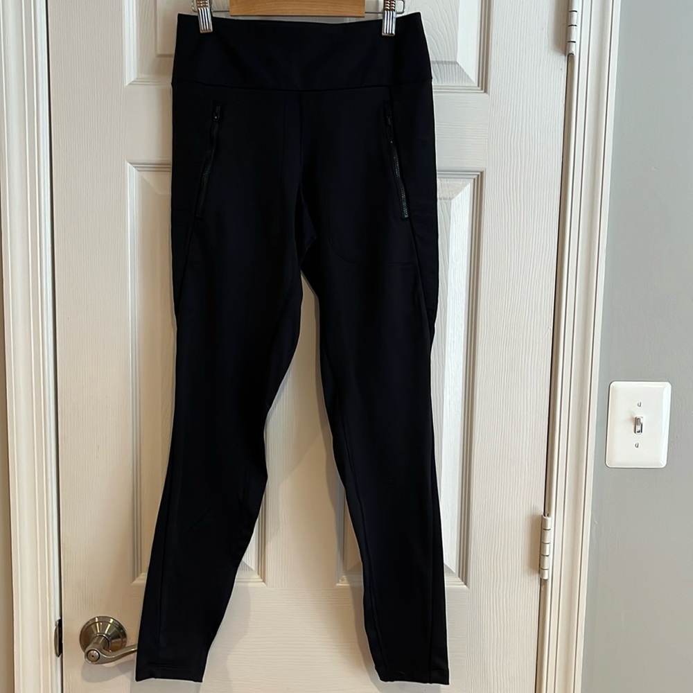 Athleta Peak Hybrid Fleece Tight size XS like new color black